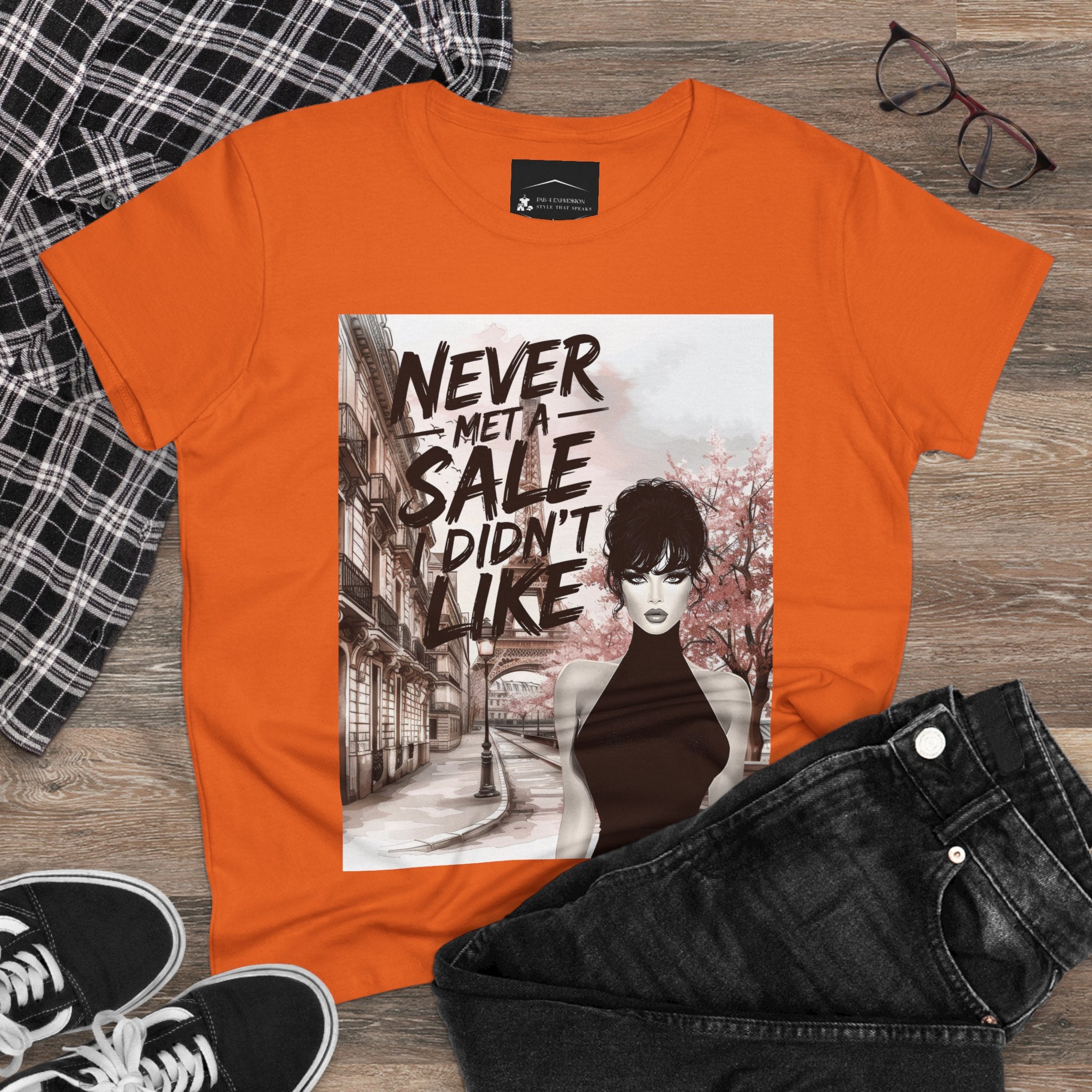 Graphic Tee — 'Never Met a Sale I Didn't Like' Women's Fashion T-Shirt